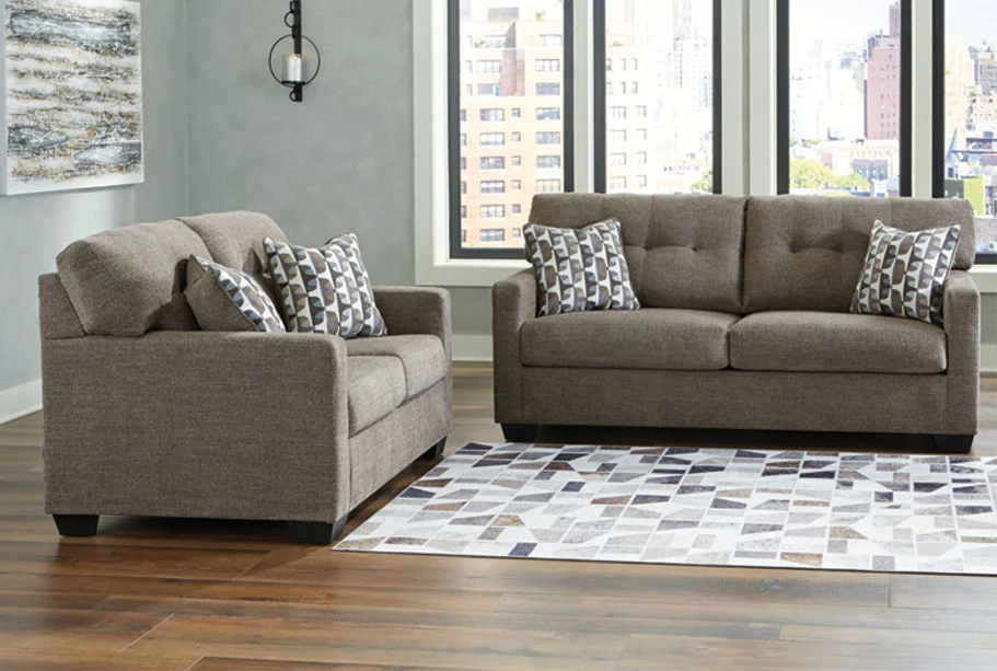 Beige fabric sofa and loveseat